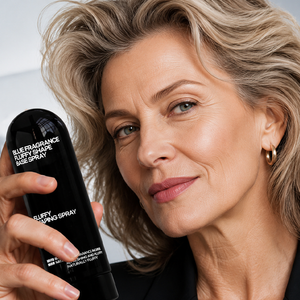 Hair styling spray close-up with mature model